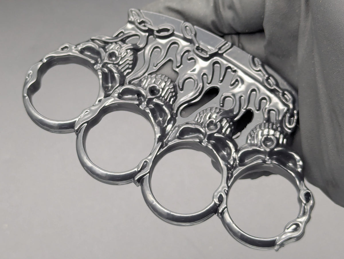 CHAINED SKULLS BLACK KNUCKLE DUSTER