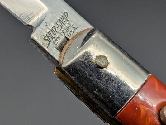 RED SWIRL SHUR-SNAP COLONIAL USA FISHTAIL SWITCHBLADE