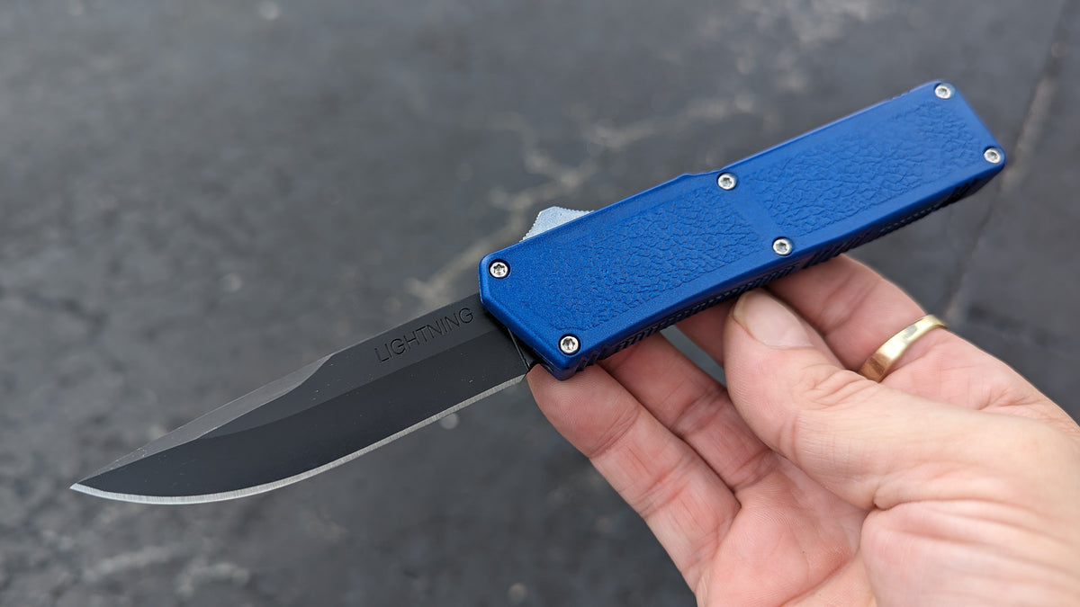 BLUE LIGHTNING OTF BLACK PLAIN EDGE DROP POINT BLADE