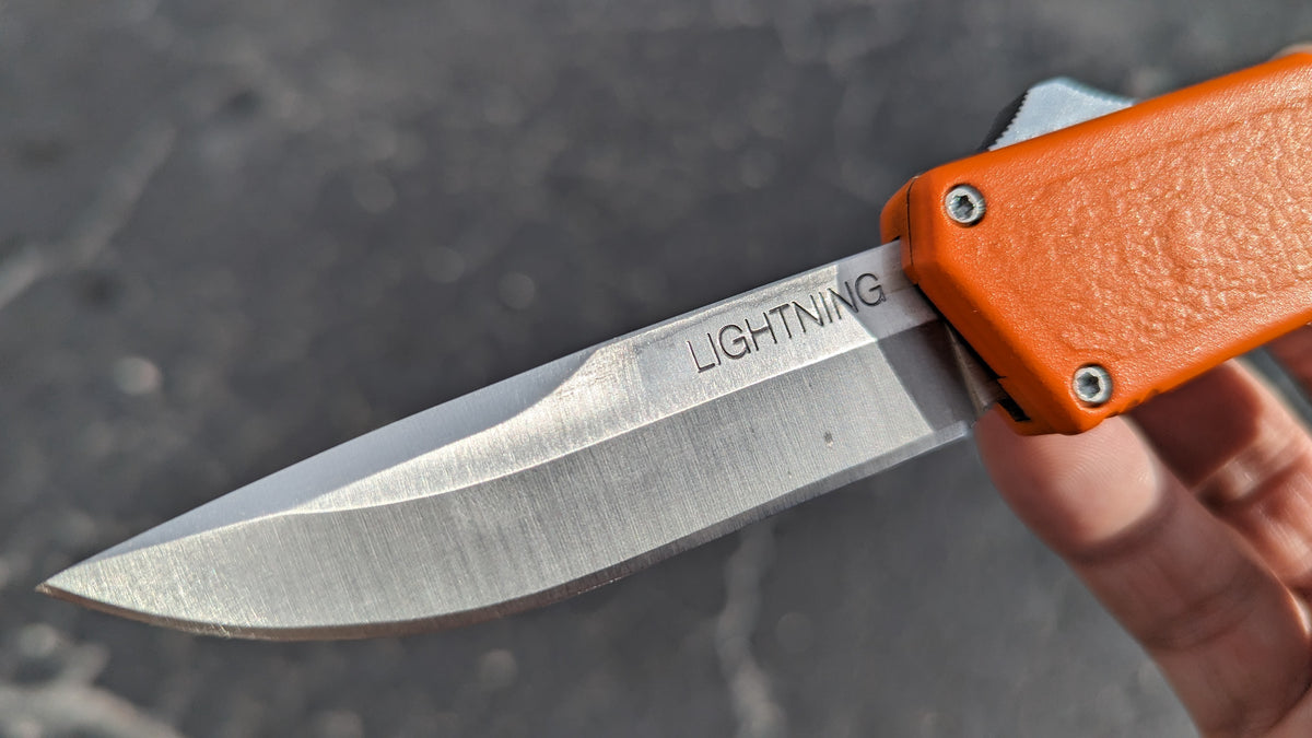 ORANGE LIGHTNING OTF KNIFE PLAIN EDGE DROP POINT BLADE