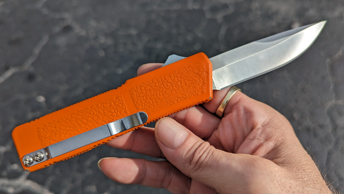 ORANGE LIGHTNING OTF KNIFE PLAIN EDGE DROP POINT BLADE