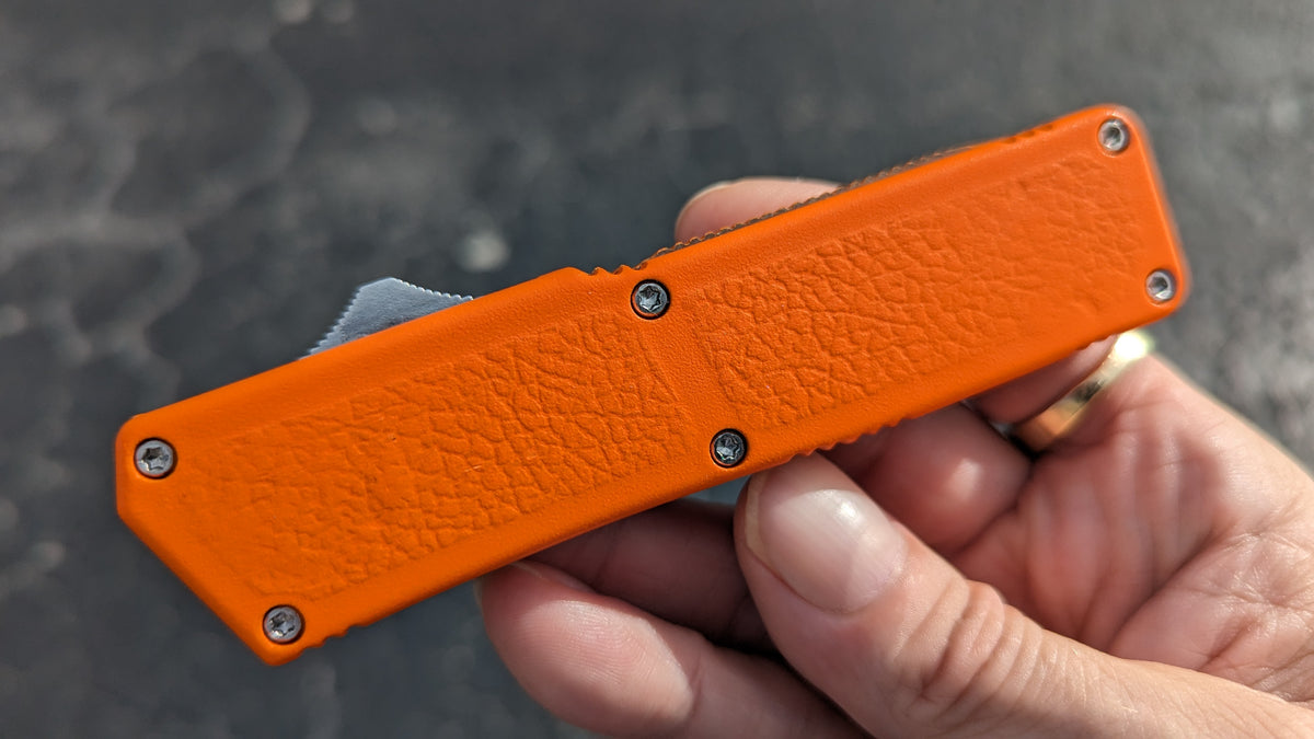 ORANGE LIGHTNING OTF KNIFE PLAIN EDGE DROP POINT BLADE