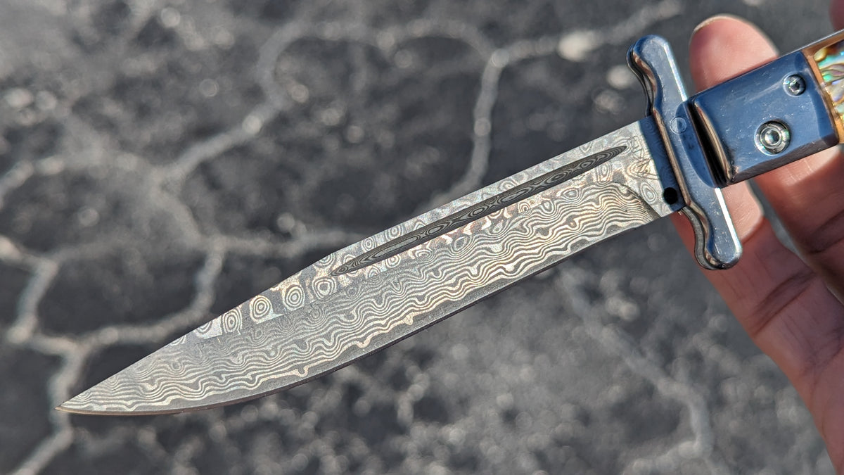 AKC WORLD 11" ROMA FAUX ABALONE DAMASCUS SWINGUARD