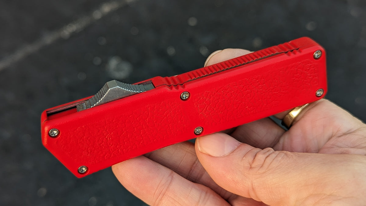 Lightning OTF Red 2-Tone Plain Edge Drop Point