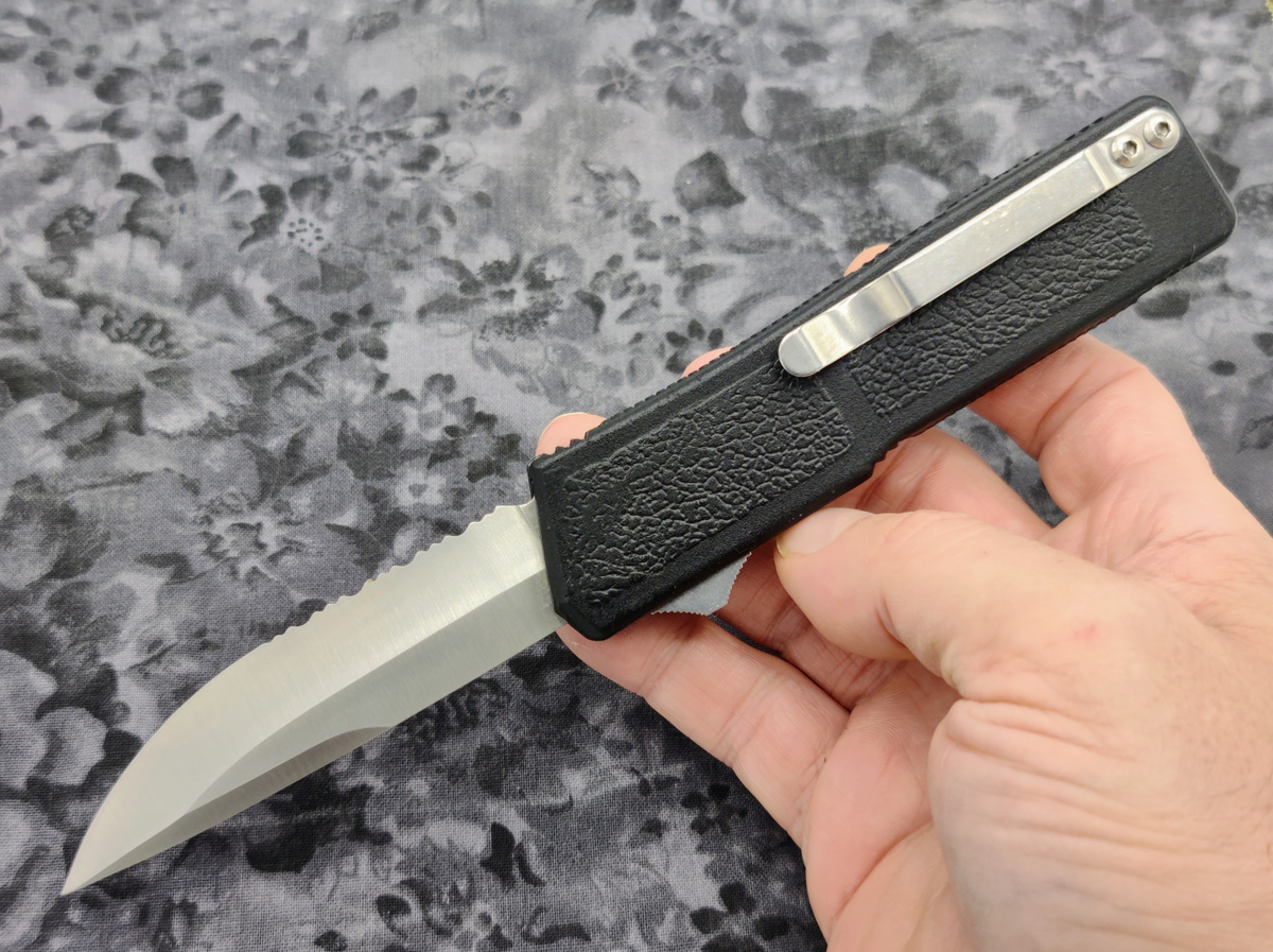 Lightning OTF Knife Black Part Serr. Drop Point Stainless