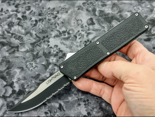 Lightning OTF Knife Black Part Serr. 2-Tone Drop Point