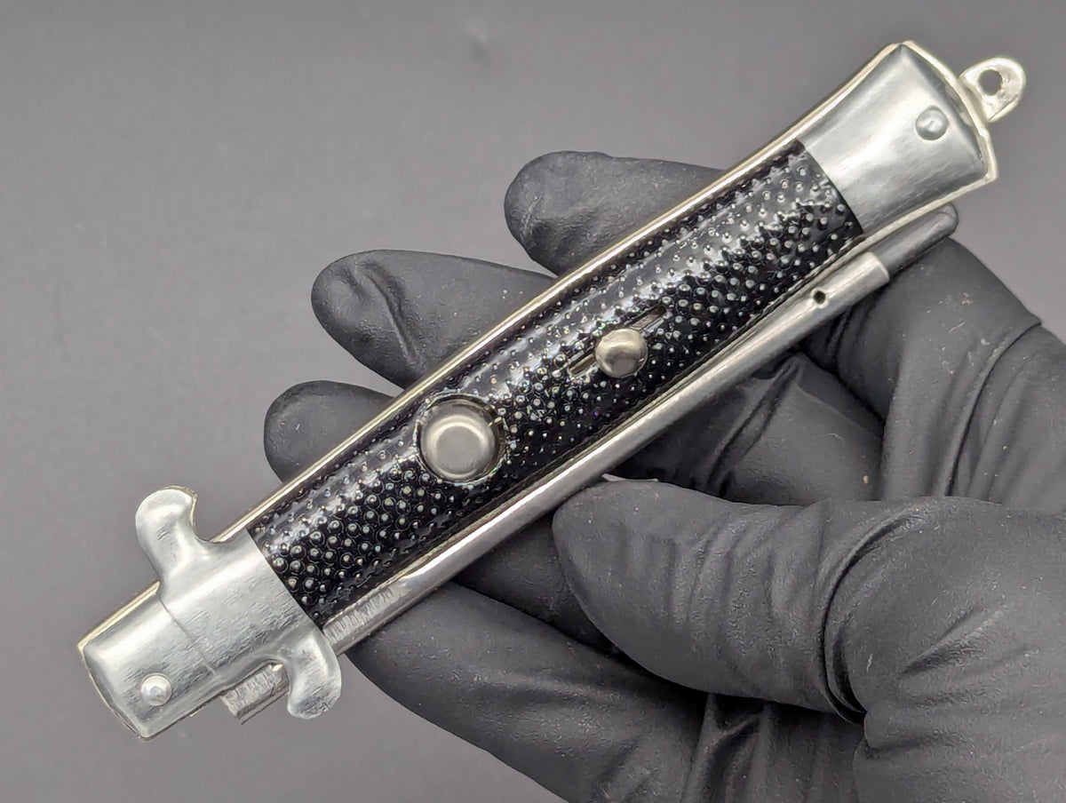 NOS 80's VINTAGE HONG KONG SWITCHBLADE COMB