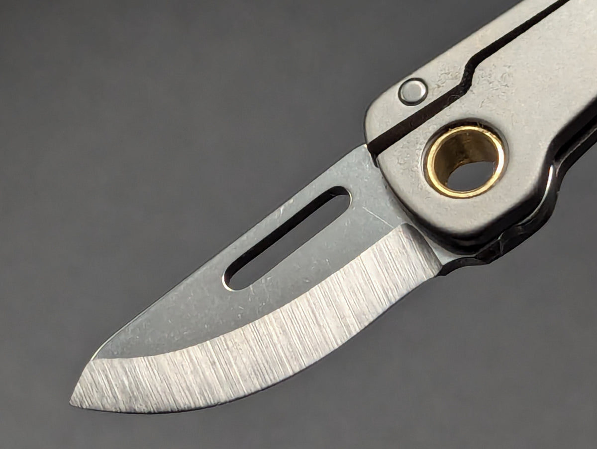 TITANIUM TWEEZER MULTI TOOL w/ 1" D2 BLADE