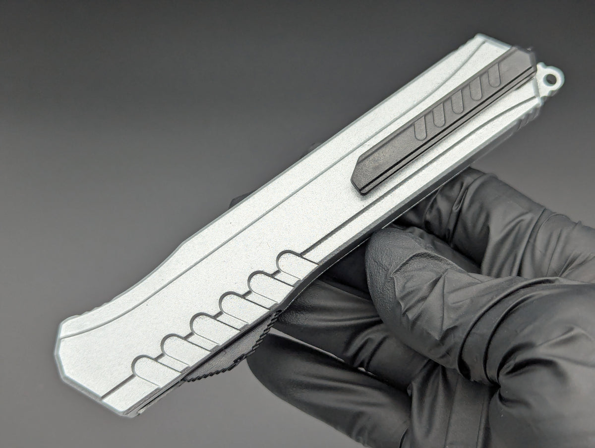 12 PC SILVER COMPOSITE D/A OTF KNIFE