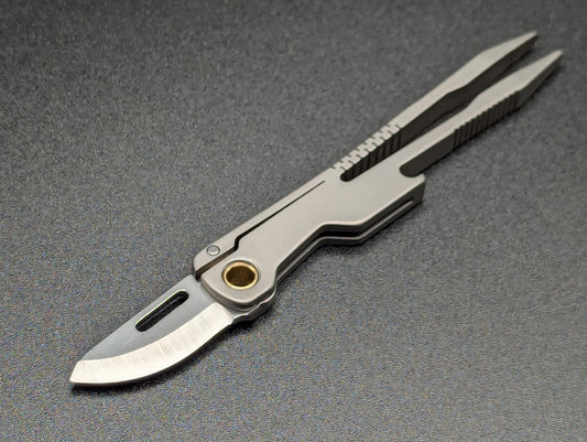 TITANIUM TWEEZER MULTI TOOL w/ 1" D2 BLADE