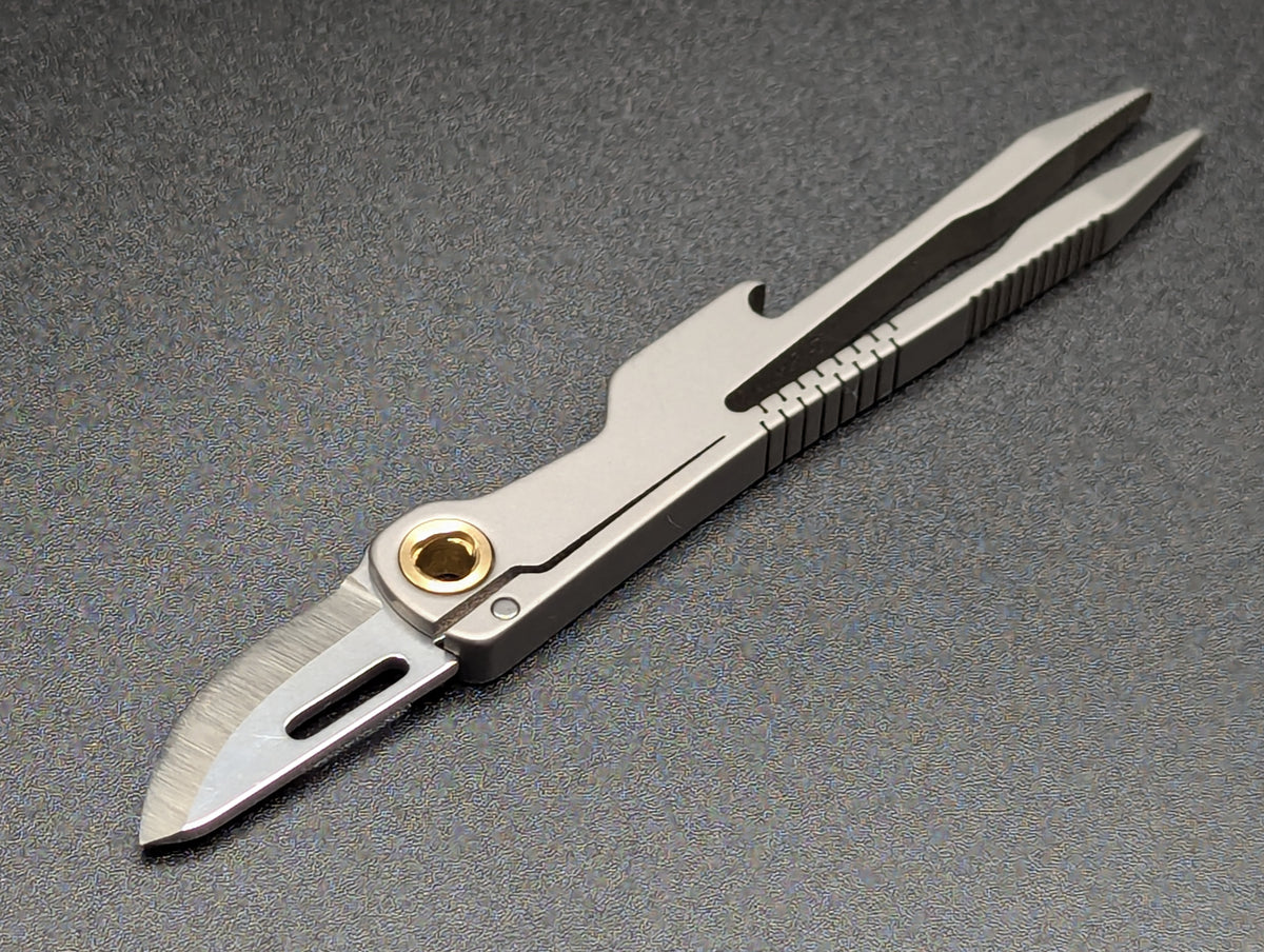 TITANIUM TWEEZER MULTI TOOL w/ 1" D2 BLADE