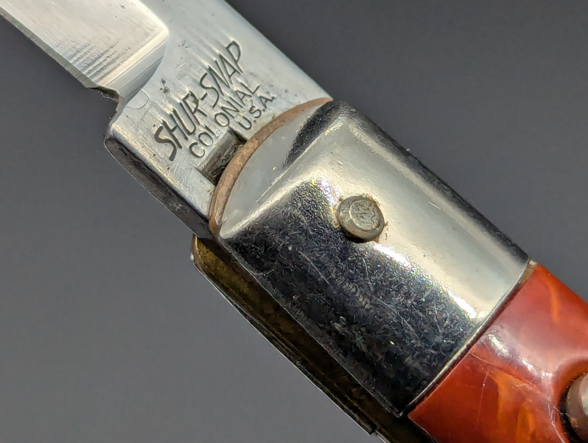 RED SWIRL SHUR-SNAP COLONIAL USA FISHTAIL SWITCHBLADE