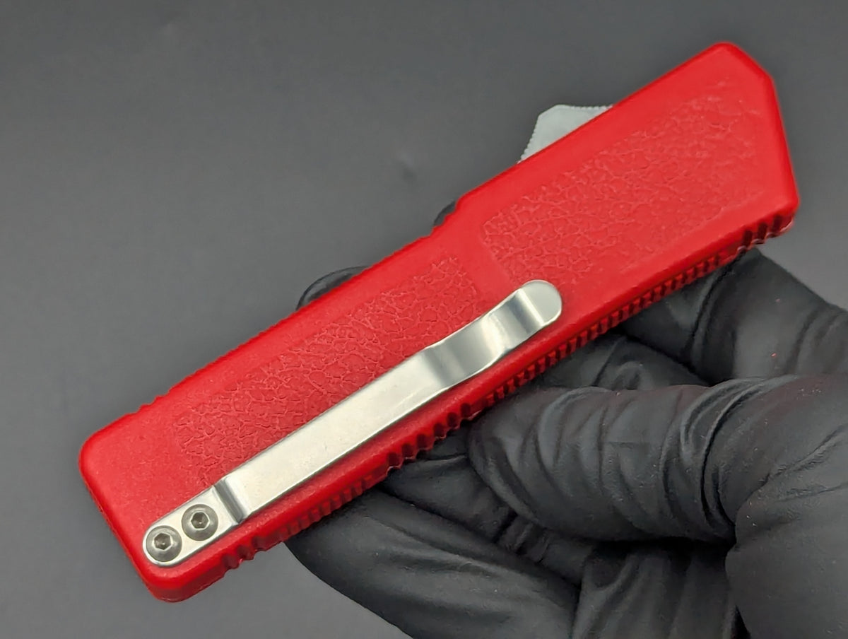Lightning OTF Knife Red Part Serr. Drop Point