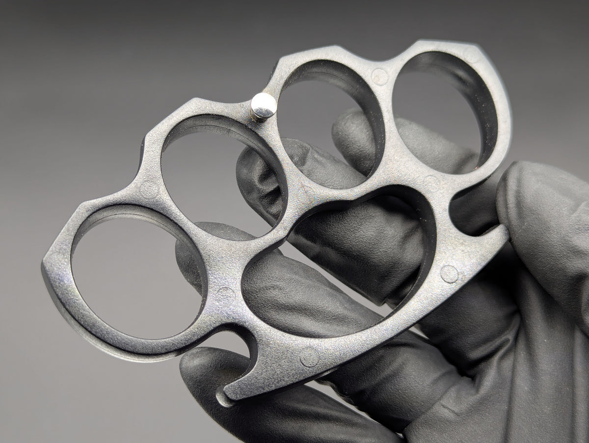 ABS PLASTIC NON PERMISSIVE ENVIRONMENT KNUCKLE DUSTERS BLACK