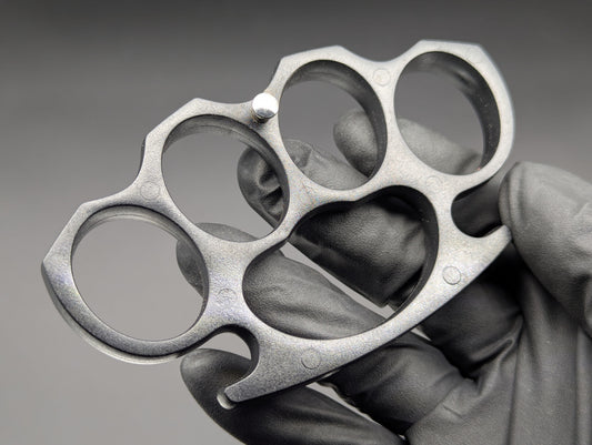 ABS PLASTIC NON PERMISSIVE ENVIRONMENT KNUCKLE DUSTERS BLACK