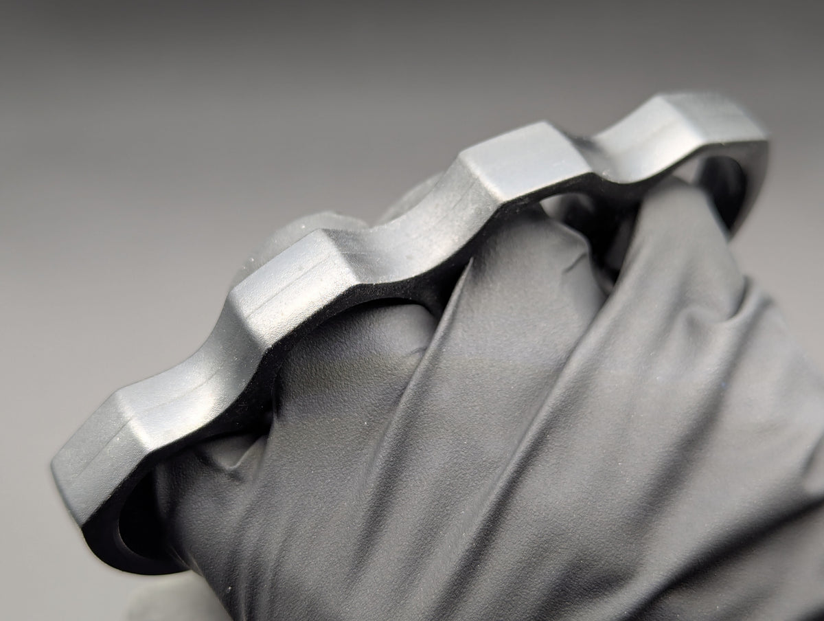 ABS PLASTIC NON PERMISSIVE ENVIRONMENT KNUCKLE DUSTERS BLACK
